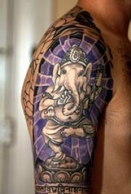 shoulder color dance like a god tattoo pattern