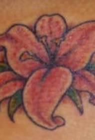 foto di tatuaggio spalla femminile piccolo giglio rosa