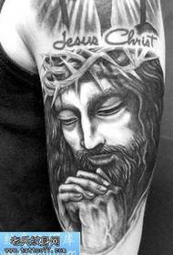 besoa gris beltza Jesus tatuaje eredua