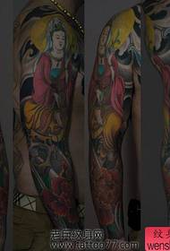 un model de tatuaj braț de flori de bujor Guanyin