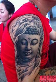 cánh tay một hình xăm Phật Guanyin