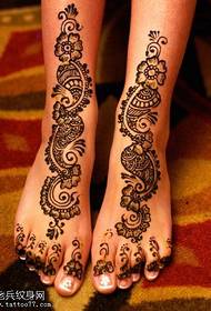 Religieuze voet bloem tattoo bloempatroon
