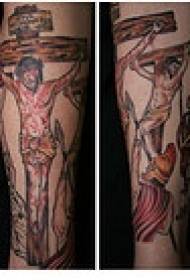 Nakakabit na may kulay na krus na Jesus tattoo na larawan
