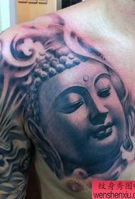 een borst een stenen Boeddha hoofd tattoo patroon