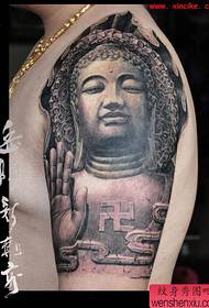 Grande scultura di pietra di tatuu di Buddha