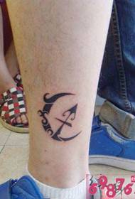 Тотем Луны с изображением татуировки Стрельца