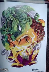 en färgglad Buddha och magisk tatueringsmönster