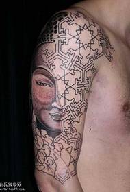 腕の抽象的な仏のタトゥーパターン