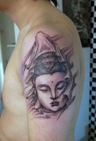 yon modèl bèl tat pouw gen yon tatoo modèl Guanyin