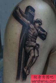 Arm et kors Jesus tatoveringsmønster