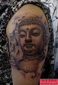 braccio classico modello di tatuaggio testa di Buddha grigio nero