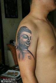 Braccio come modello di tatuaggio di Buddha