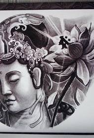 a Guanyin lotus tatu ስርዓተ-ጥለት