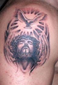 schouder Jezus en duif tattoo foto