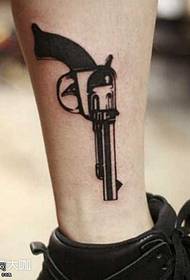 Patró de tatuatge de pistola de mà negra