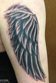 manoj Enŝovu la sonĝan flugilon tatuaje