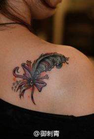 popular good-looking feather bow tattoo pattern