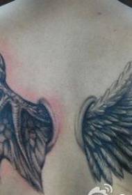 natrag uzorak tetovaže krila anđela i demona