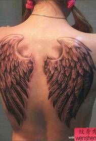 ženski hrbet priljubljen klasičen vzorec tatoo na polovici hrbta