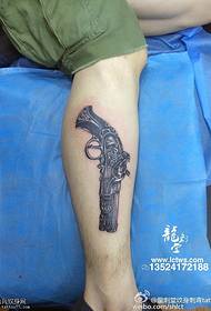 Pola tattoo pistol realistis