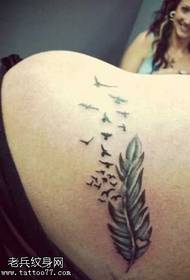 Back feather tattoo maitiro