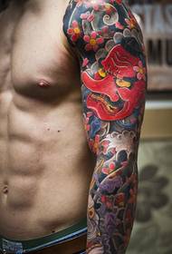 vyriškas gražus gėlių rankos tatuiruotės modelis