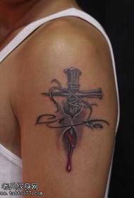 arm blood needle cross tattoo pattern