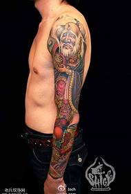 modello tatuaggio braccio soldi fata