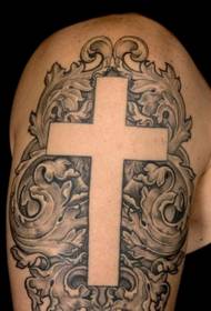 stort kors tatueringsmönster av olika stilar på den stora armen