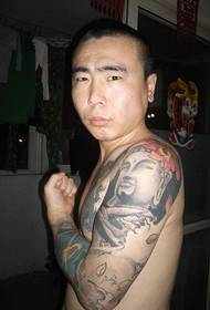 hombre brazo arte Buda estatua tatuaje foto
