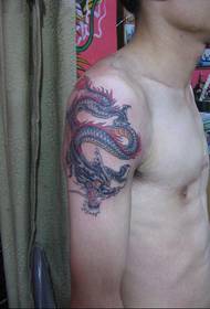 Asmenybės vyro rankos „Raptors“ tatuiruotės paveikslėlis