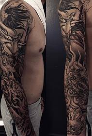 earm swartgriis lykas Tang liuw tatoetmuster