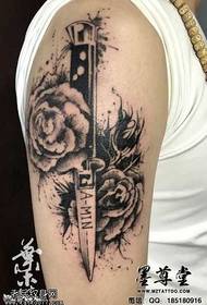 arm ink knife tattoo pattern
