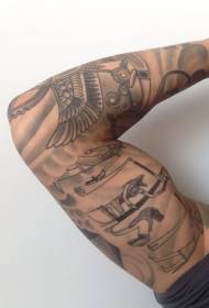 Egyptian mural tattoo pattern on the entire arm