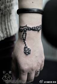 Trendigt tatueringsmönster för armband