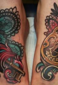 Splendido lucchetto dorato color piede con foto tatuaggio chiave