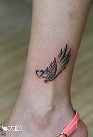 Узорак тетоваже крила ногу