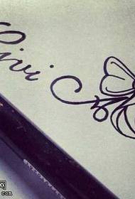 Modello di tatuaggio manoscritto fiocco lettera
