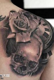 Shoulder skull rose tattoo pattern