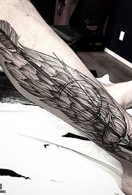 Motivo per tatuaggi ali linea polpaccio