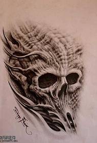 Ka moʻo ʻana o ka manuscript personality tattoo skull
