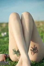 Tren kaki populer pola busur tato
