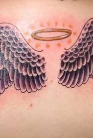 Modellu culuritu di tatuaggi di ali d'angelo