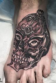 Tatuaggio teschio sul piede