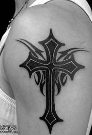 Amaphethini we-arm cross totem tattoo