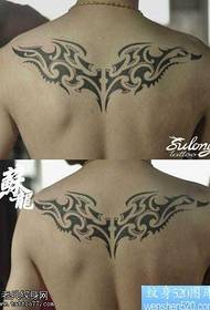Ang sumbanan sa likod nga pakpak nga totem tattoo