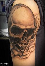 Modello tatuaggio braccio tozzo