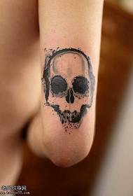 Ingalo ye-Arm ink encane ye-skull tattoo