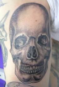 Arm sort grå realistisk menneskelig kranium tatoveringsmønster