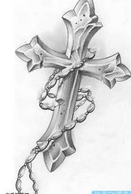 Manuskript cross tattoo patroan